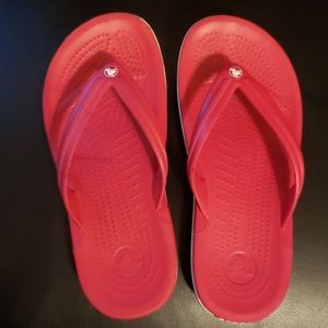 red croc flip flops